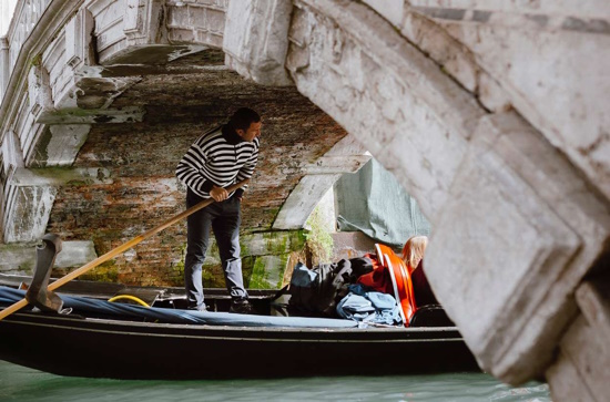 Deep into Venice: Morning walking tour with shared Gondola ride.
